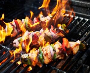 grilling-chicken-kabobs-on-flaming-grill